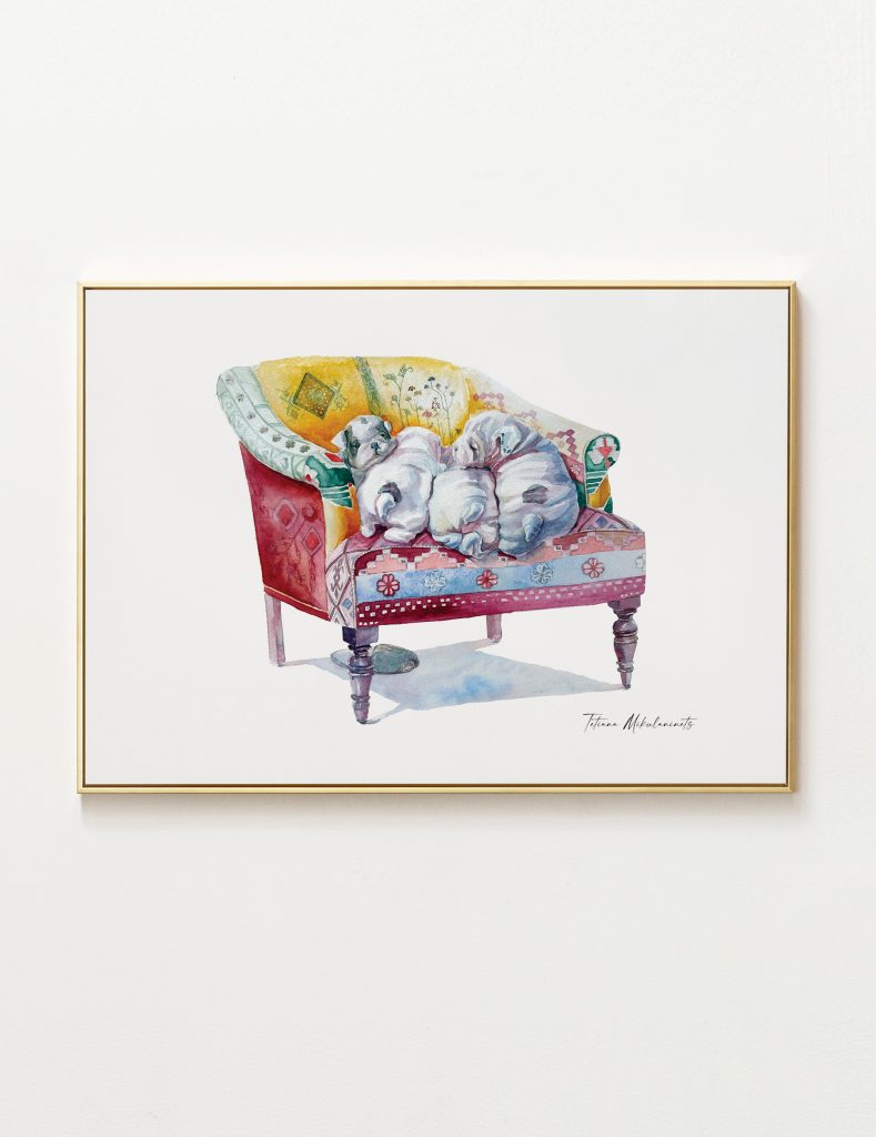 Tetiana Makukhinets showing four plush white bulldog or pug puppies curled up on a highly decorative, antique-style fabric chair.