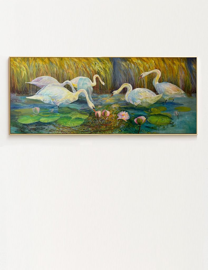 A painting of five white swans wading in blue-green water surrounded by large lily pads and pink lotus flowers, set against a background of tall, golden-yellow reeds.