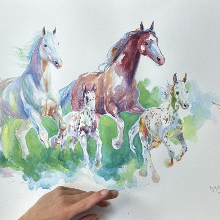 Watercolour painting of four galloping horses—one white, one chestnut, and two spotted Appaloosas—running together across a vibrant green and blue abstract background.