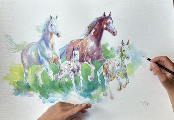 Watercolour painting of four galloping horses—one white, one chestnut, and two spotted Appaloosas—running together across a vibrant green and blue abstract background.