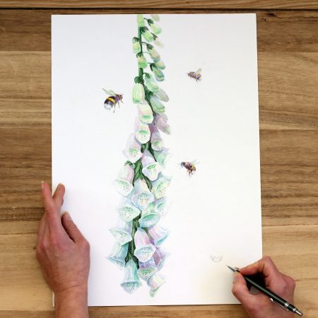 Watercolor illustration of a tall foxglove stem with pale purple and green bell-shaped flowers, accompanied by three bees flying around the blooms on a white background